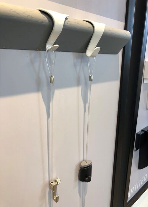 Sistema de rieles para cuadros para PANEL